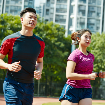 Two people jogging outdoors
